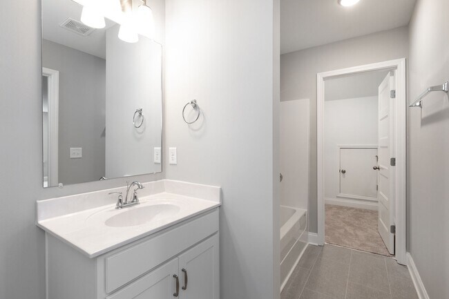 Building Photo - **BE THE LUCKY ONE TO LIVE IN THIS 2022-BUILT UPSCALE COTTAGE HOME IN THE PRESERVE AT BELLE POINTE**