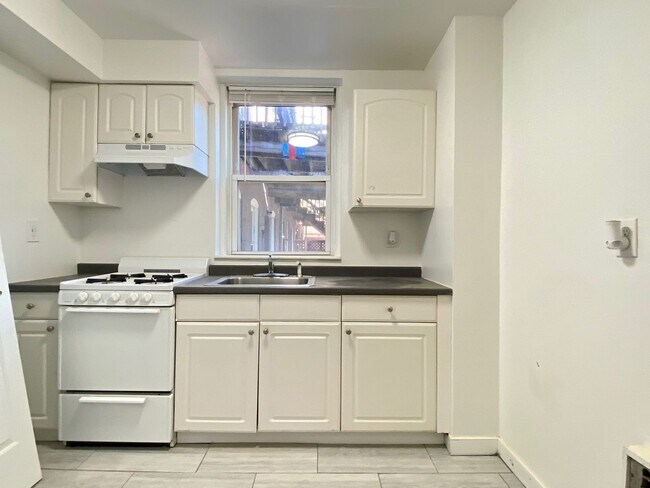 Building Photo - Nicely renovated 2 bed for now.