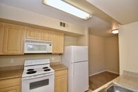 Building Photo - Cozy 1 Bedroom Condo 2nd Floor At Coronado...