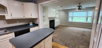 Building Photo - Check This One OUT!! To View is to Rent! 3 Bedroom, 1 Bath. Hardwood Floors, Tile and Newer Carpe...