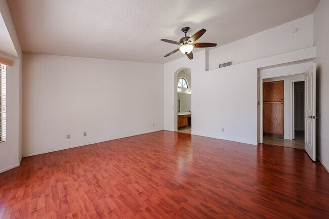 Building Photo - Welcome to this stunning 4-bedroom, 2-bath...