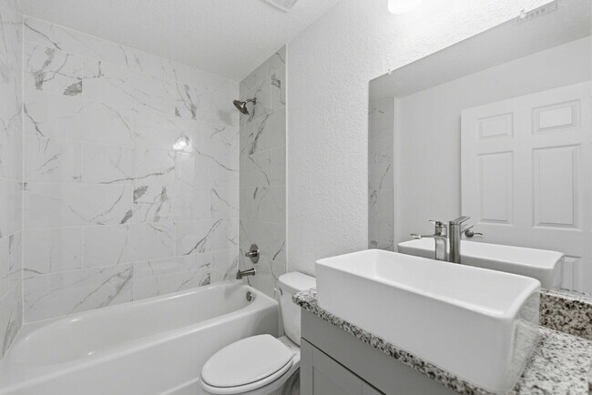 Building Photo - Available Now! New 3/2 Home with Large Backyard and Front Porch