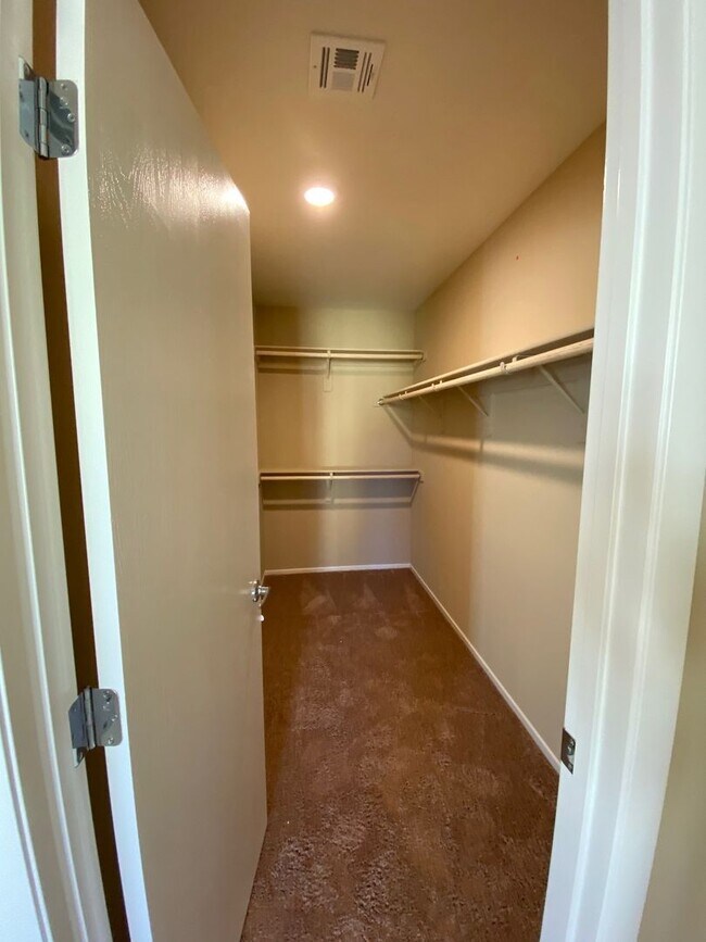 Building Photo - Spacious Townhouse with Loft & Rare 3-Car Garage!