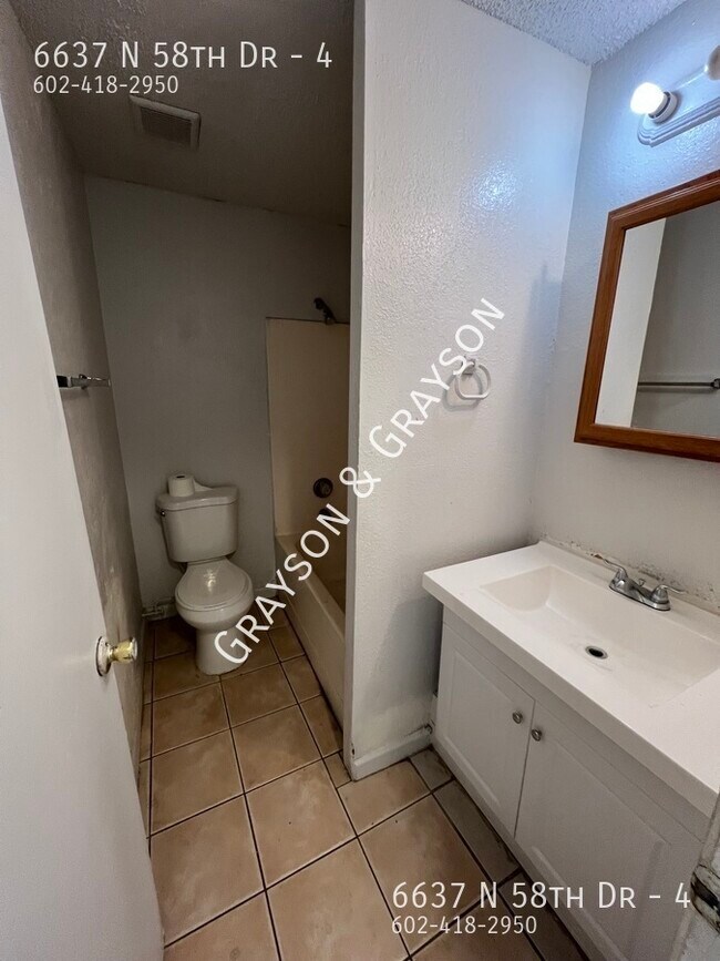 Building Photo - 6637 N 58th Dr