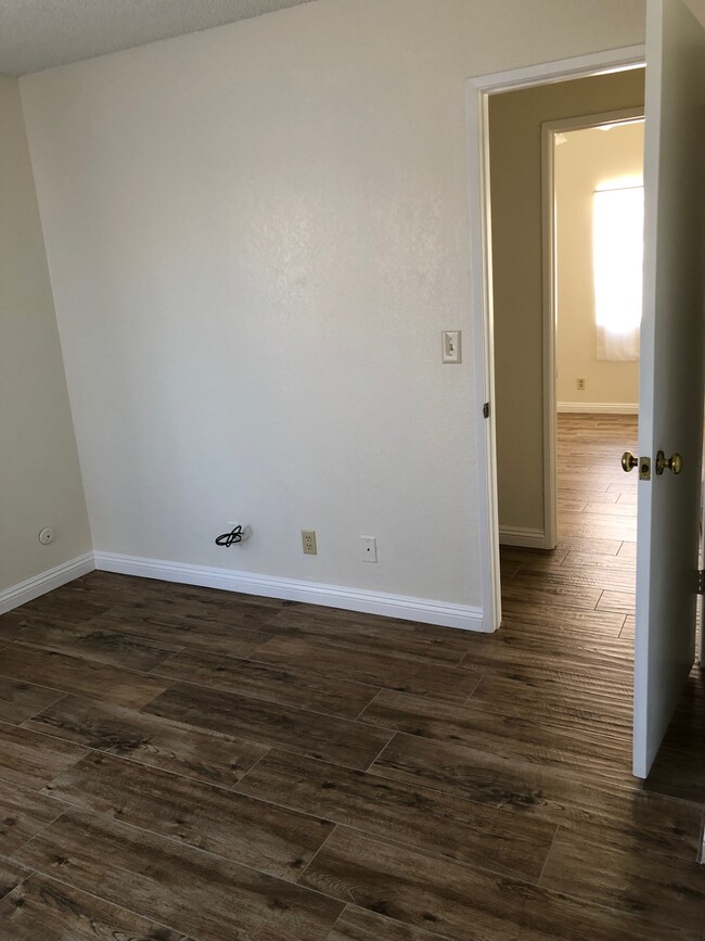 North Bedroom looking into South Room - 3109 Titcher Ln