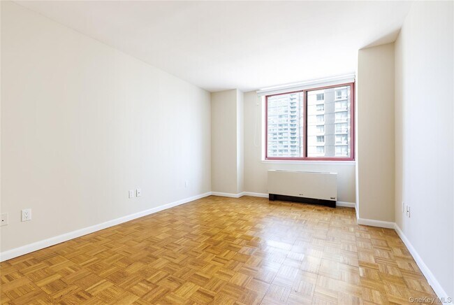 Building Photo - 4-74-74 48th Ave