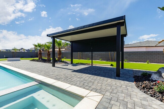 Building Photo - Gorgeous Custom Single Story with RV Garage