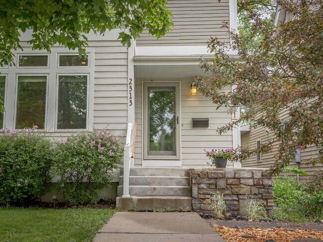 Building Photo - Spacious 5-Bedroom Minneapolis Gem with Gas Fireplace & Finished Basement