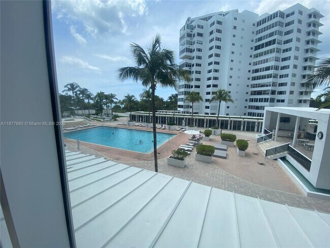 Building Photo - 10275 Collins Ave