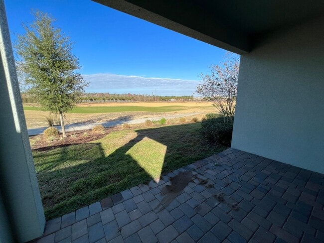 Building Photo - 55+ community in Four Seasons of Orlando 2 bedroom, 2 bathroom, with a 2 stall attached garage on...