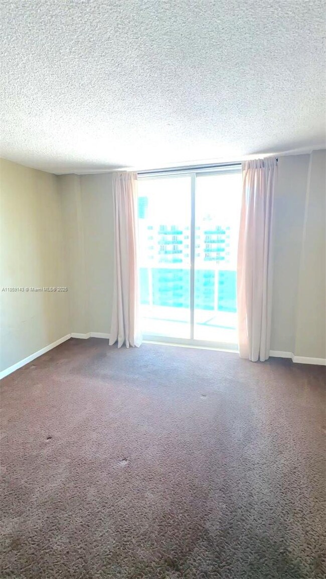 Building Photo - 19390 Collins Ave