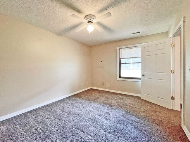 Building Photo - Beautifully Redone Modern Townhome with Large Deck, 2-Car Garage, Granite Kitchen, Vaulted Ceilin...