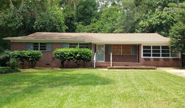 Building Photo - Charming 4 bedroom home for rent close to hospitals with wood floors. Available early August 2026...