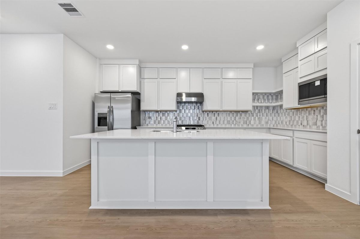 Building Photo - 27435 Sunterra Village Dr