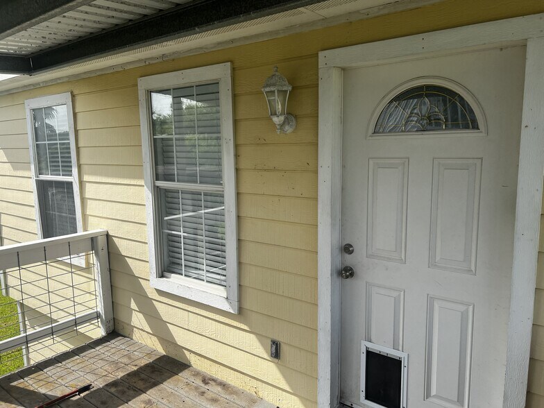 Entrance with covered porch - 233 13th St