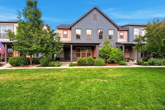 Building Photo - $2,645.95, 3 bed, 2.5 bath end unit located in Aurora with a washer and dryer.