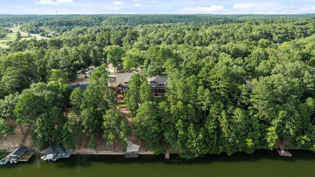 Building Photo - Serene Bella Vista Lakeside 4 bedroom
