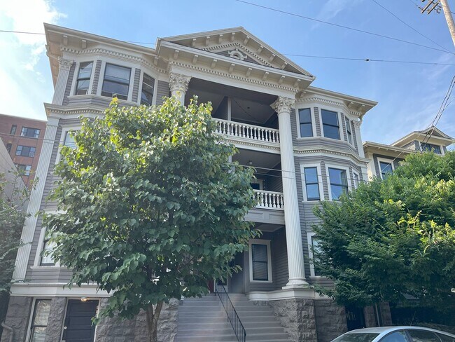 Building Photo - Charming NW Portland 1-Bedroom with Brick Accents & Modern Touches