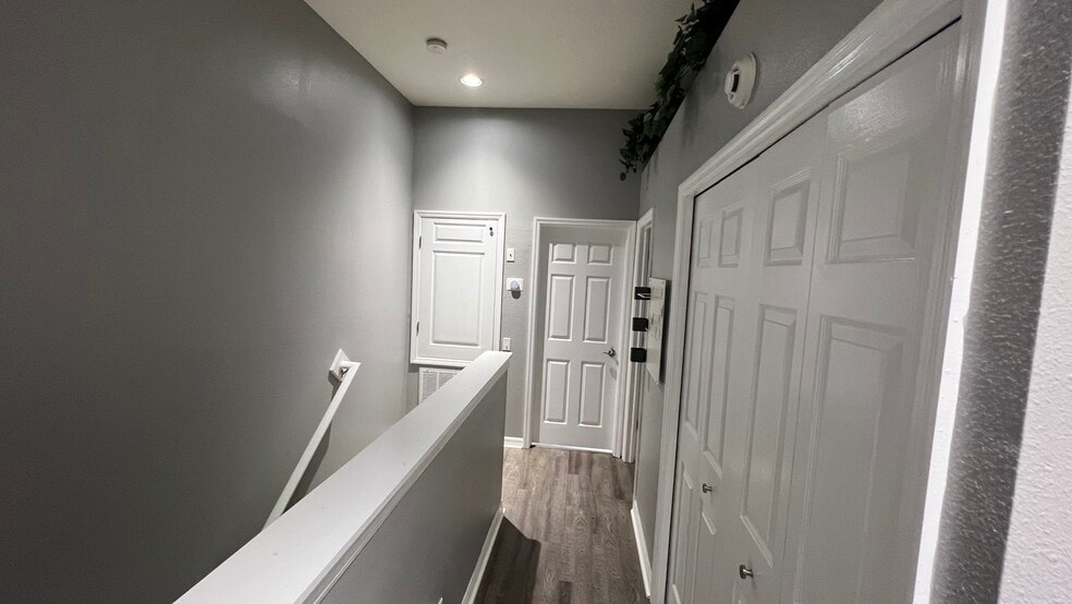 Upstairs Foyer with Laundry on right - 4219 Key Thatch Dr