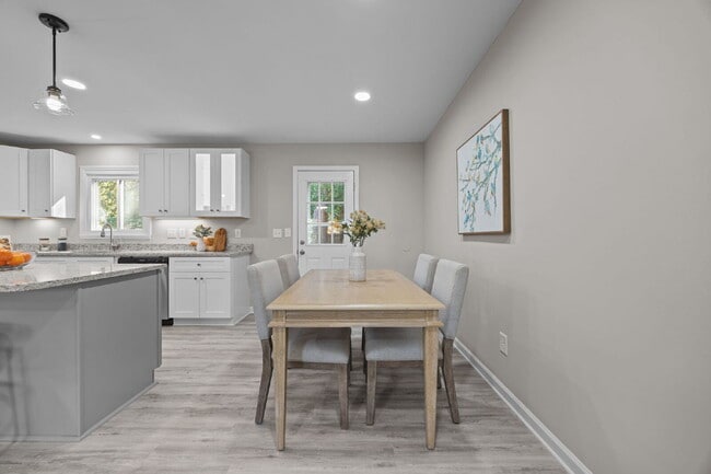 Building Photo - Charming 3-Bed Home with Granite Touches & Finished Basement in Raleigh!