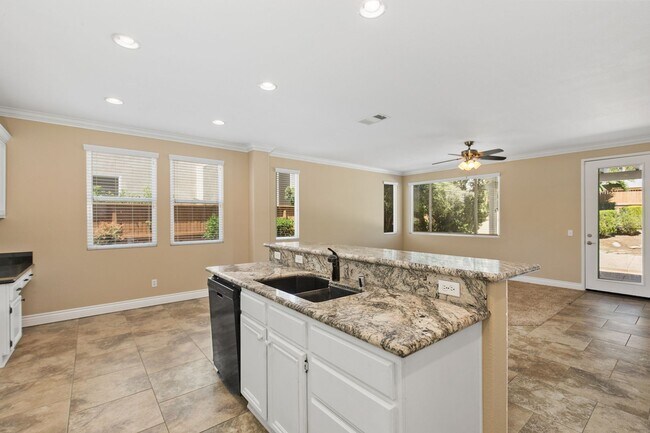 Building Photo - Paseo Del Sol, 5 br/3 ba House, 2-Story, 3 car gar, yard, corner house, gardener, granite, hardwo...