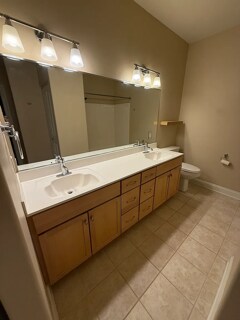 Double vanity bathroom with linen closet - 1925 N Water St