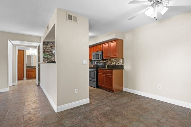 Building Photo - SE!!! Gated!! 1 Bedroom 1st Floor!! One Car Garage!!! Community Pool, Spa, Clubhouse!!! All tile ...