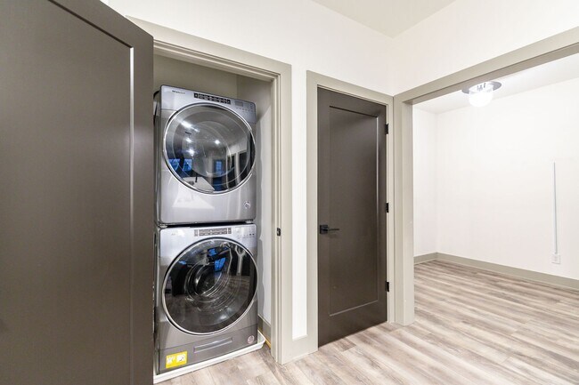 Building Photo - Modern Living Meets Walkable City Charm in...