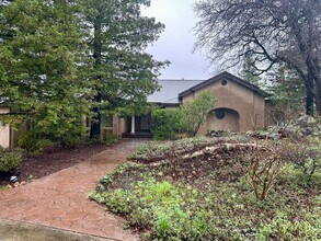 Building Photo - Available now, Executive 4 bdrm home with pool & hot tub!