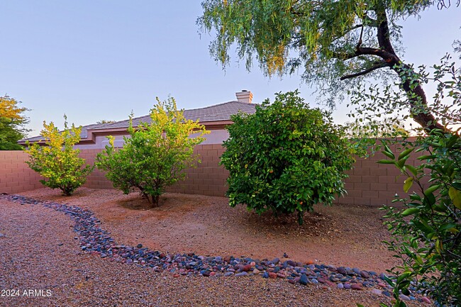 Building Photo - 6564 E Whispering Mesquite Trail