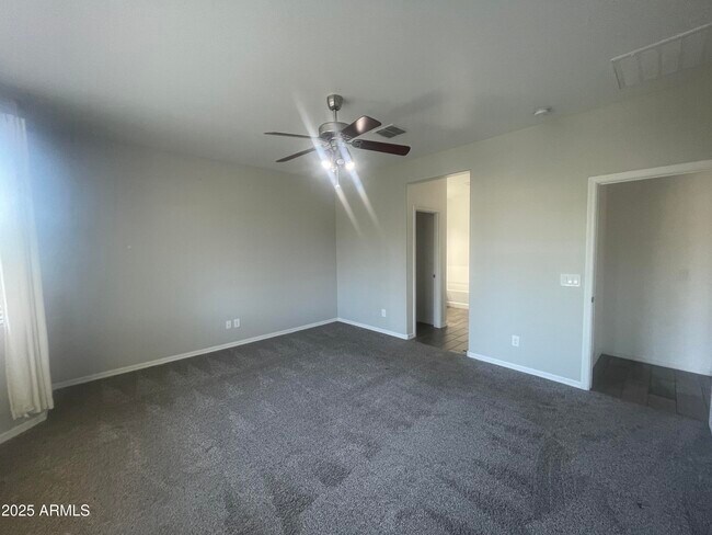 Building Photo - 13159 W Rowel Rd