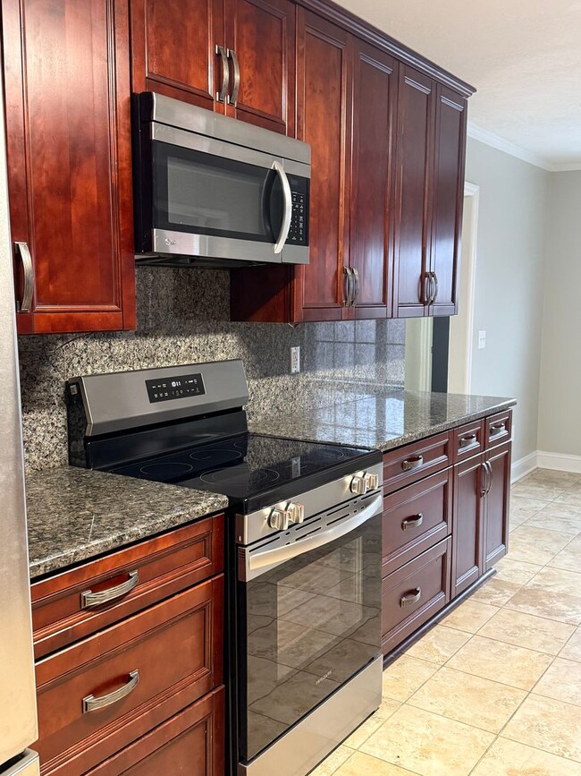 Building Photo - HOME FOR LEASE 4 BR 2 BATH RANCHSTYLE  SPLIT FLOOR PLAN AND OPEN  LARGE  FENCED BACKYARD  CONVENI...