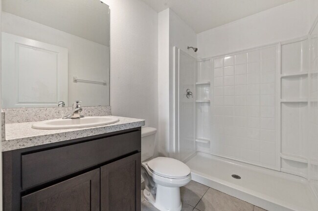 Building Photo - "Spacious 5-Bedroom Haven with Stunning Lake Views & Granite Elegance in Riverview!"