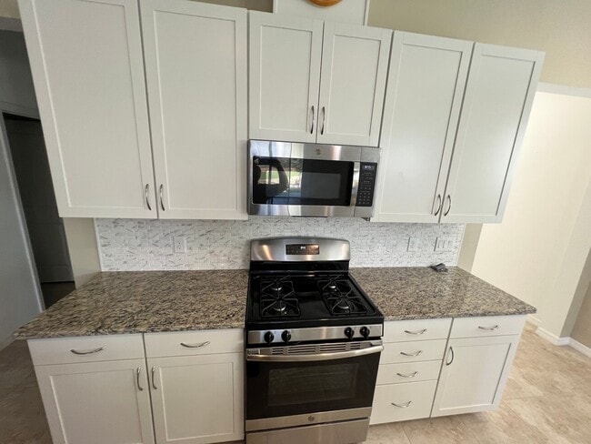 Building Photo - 55+ community in Four Seasons of Orlando 2 bedroom, 2 bathroom, with a 2 stall attached garage on...