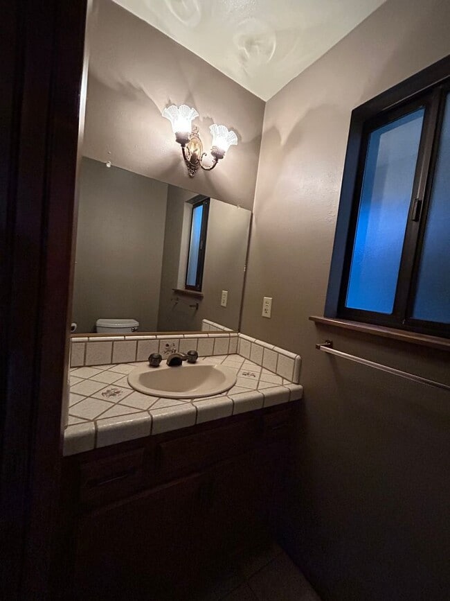 Building Photo - 6367 Woodman Dr