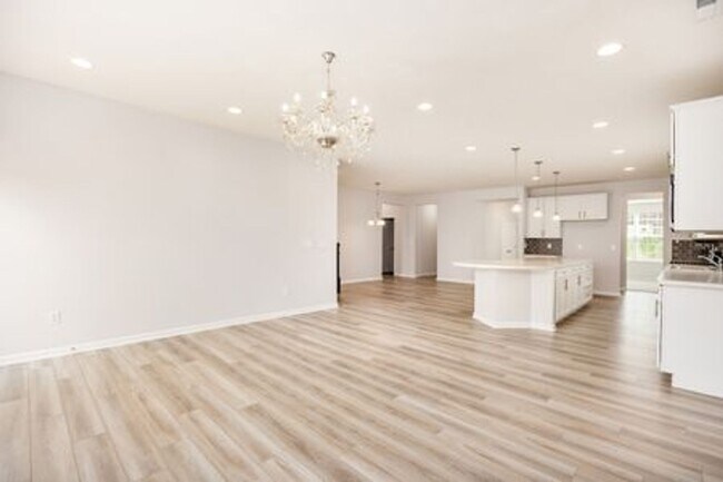 Building Photo - Updated 3-Bedroom Home with 3 Baths, Open-Concept Layout, Luxury Flooring & Bright Modern Kitchen