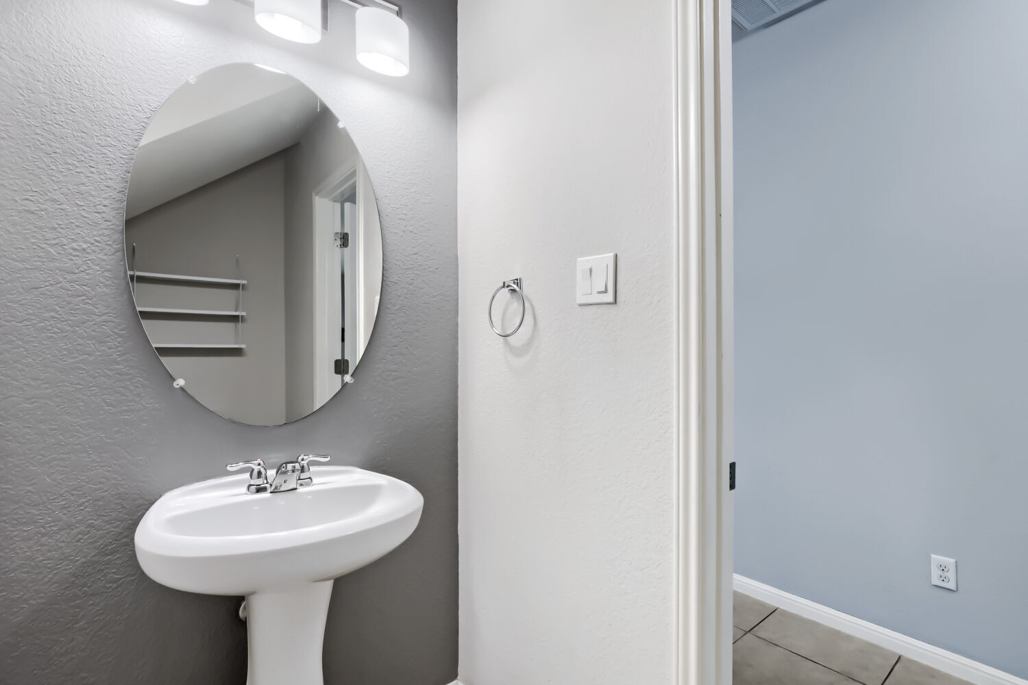 Half bath downstairs with storage space - 1900 Little Elm Trl