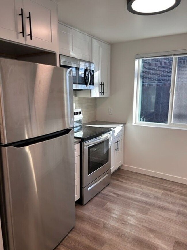 Building Photo - Completely Remodeled 2 BR/2 BA House available in the Central District