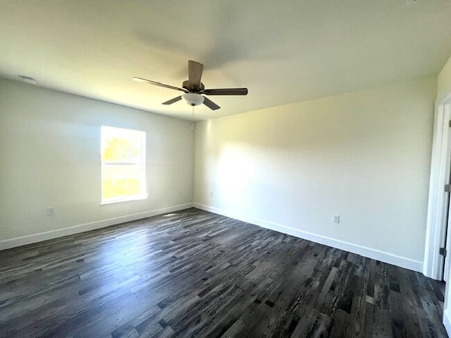 Building Photo - Available Now!! NW CAPE CORAL - 4 Bedrooms - 3 Bathrooms - 2 Car Garage