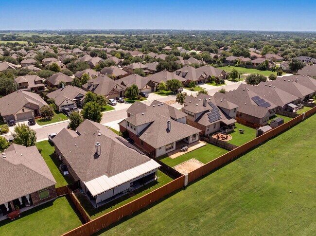Building Photo - No Rear Neighbors, 3 Car Garage, a Chef's Kitchen, and Room for Everyone