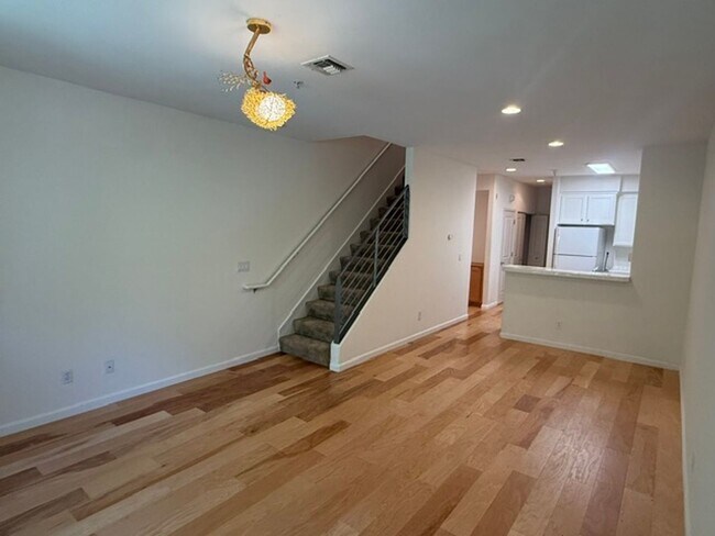 Building Photo - Large 3-Bedroom, 3.5 Bathroom Townhome in Metro Walk Village Neighborhood