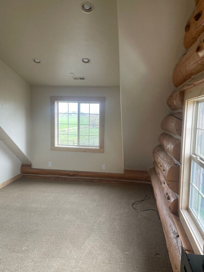 Building Photo - Charming Log Home For Rent with Large Shop & Spacious Yard