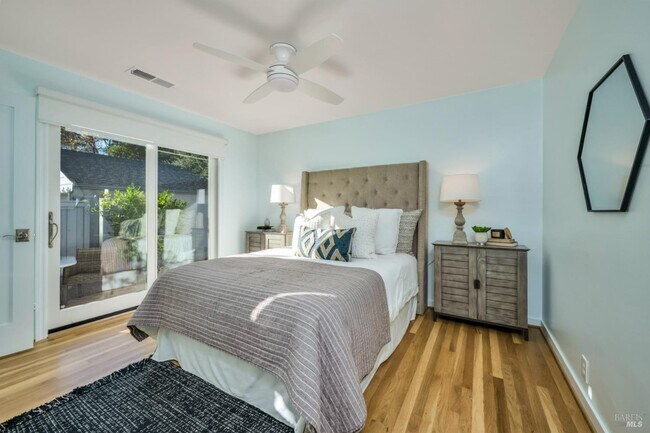 Master bedroom with sliding door access to outdoor patio & hot tub - 163 California Ave