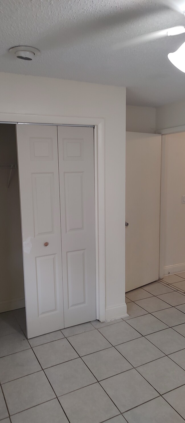 Sliding door closets in each bedroom - 12130 Gibbs Rd