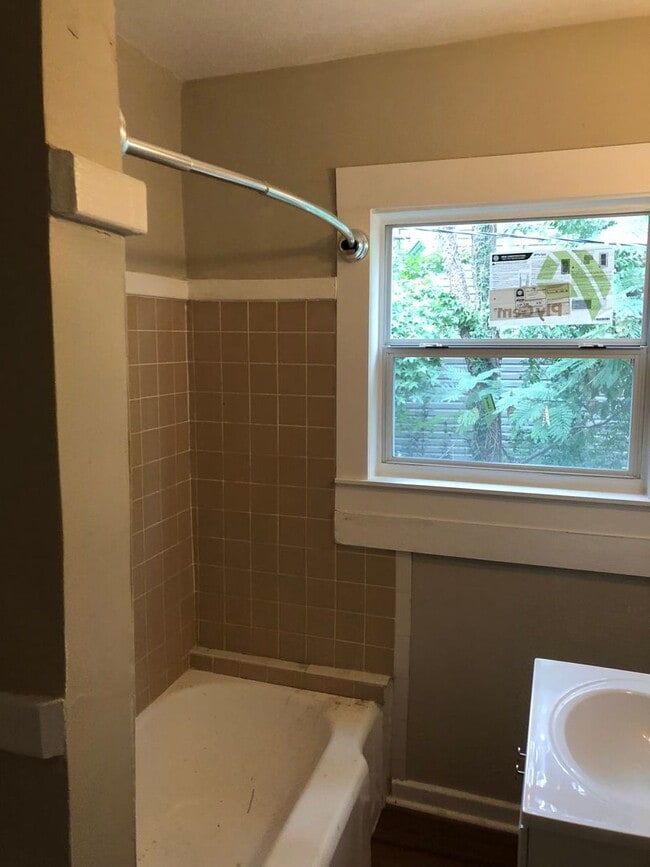 Building Photo - Freshly Painted 2x1 with Brand-New Plank F...