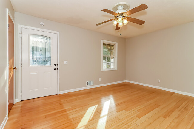 Building Photo - Bright Interiors & Spacious Backyard