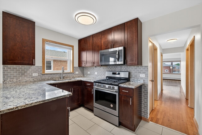 Building Photo - 8312 W Summerdale Ave