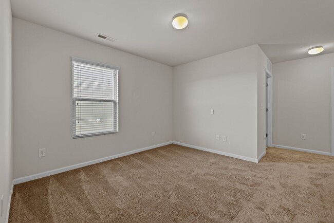 Building Photo - Spacious 5 Bedroom Home with 2-Car Garage,...