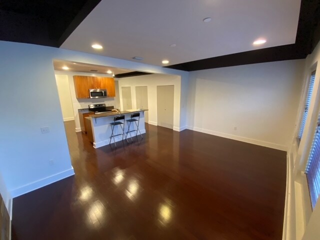Living room and open kitchen - 62 West Colonial Drive