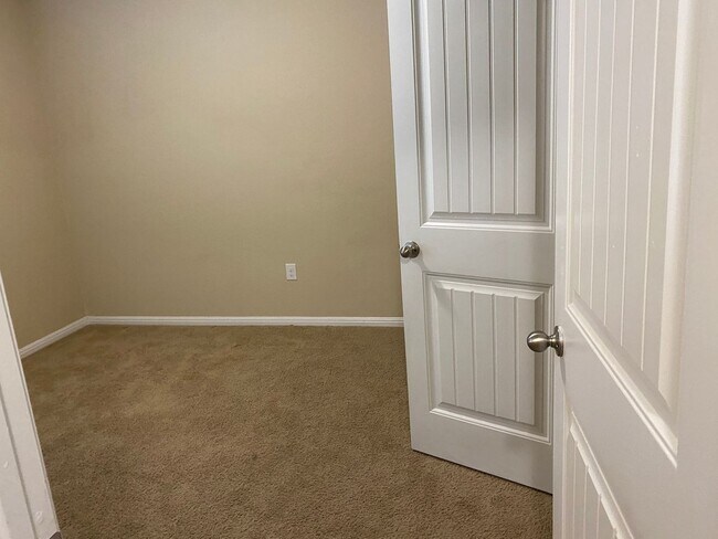 Building Photo - Three Bedroom, Two Bath, Two Car Garage, Washer and Dryer are included.